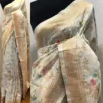 White Banarasi Silk Saree with Gold Zari Weaves