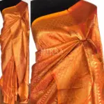 Pumpkin Orange Banarasi Silk Saree with gold zari weaves