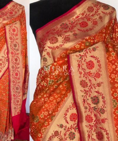 Copper Orange Banarasi Silk Saree adorned with Beautiful Patola Weaves