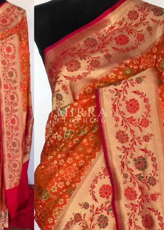 Copper Orange Banarasi Silk Saree adorned with Beautiful Patola Weaves