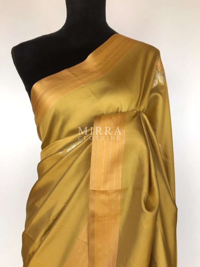 Green Banarasi Silk Saree with Gold and Silver Zari Weaves