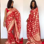 Red Banarasi Silk Saree in Pure Khaddi Georgette adorned with Antique Gold Zari Motifs