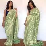 Sea Green Banarasi Silk Saree in Pure Khaddi Georgette adorned with Antique Gold Zari Motifs