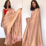 Baby Pink Banarasi Silk Saree In Georgette with woven zari motifs