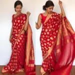 Scarlet Red Banarasi Silk Saree in Georgette adorned with Gold Zari Motifs