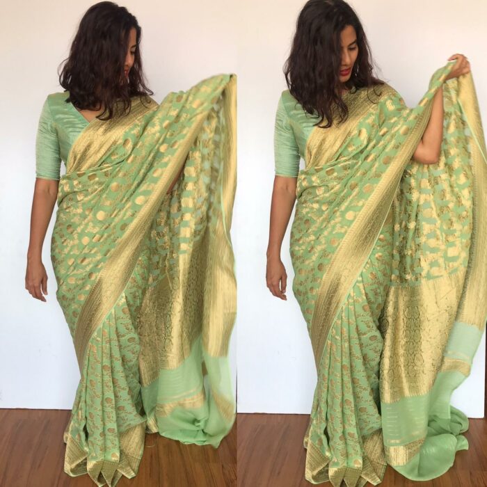 Sea Green Banarasi Silk Saree in Georgette adorned with Gold Zari Motifs