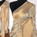 Ivory Banarasi Silk Saree in Georgette adorned with Gold Zari Motifs