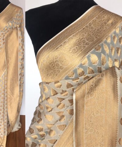 Ivory Banarasi Silk Saree in Georgette adorned with Gold Zari Motifs
