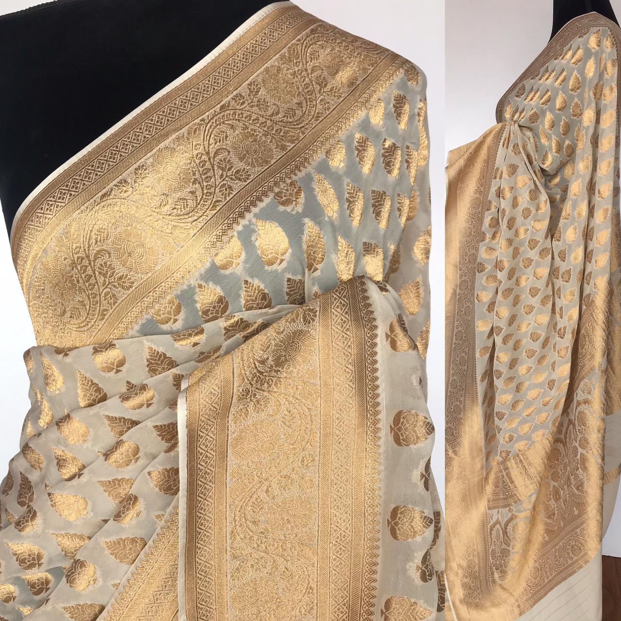 Ivory Banarasi Silk Saree in Georgette adorned with Gold Zari Motifs