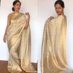 Ivory Banarasi Silk Saree in Georgette adorned with Gold Zari Motifs - Image 2