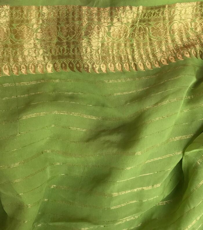 Sea Green Banarasi Silk Saree in Georgette adorned with Gold Zari Motifs