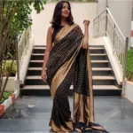 Black Banarasi Silk Saree In Georgette with Gold Zari Weaves