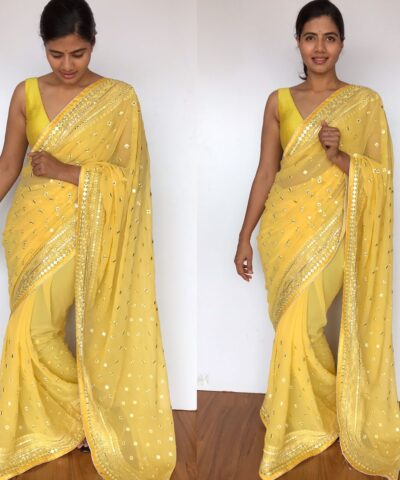 Butter Yellow Georgette Saree adorned with Mirror Work