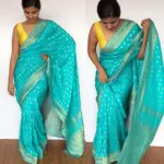 Blue Banarasi Silk Saree in Georgette with Gold Zari Weaves highlighted with Beautiful Zardozi Embroidery and Gota Piping