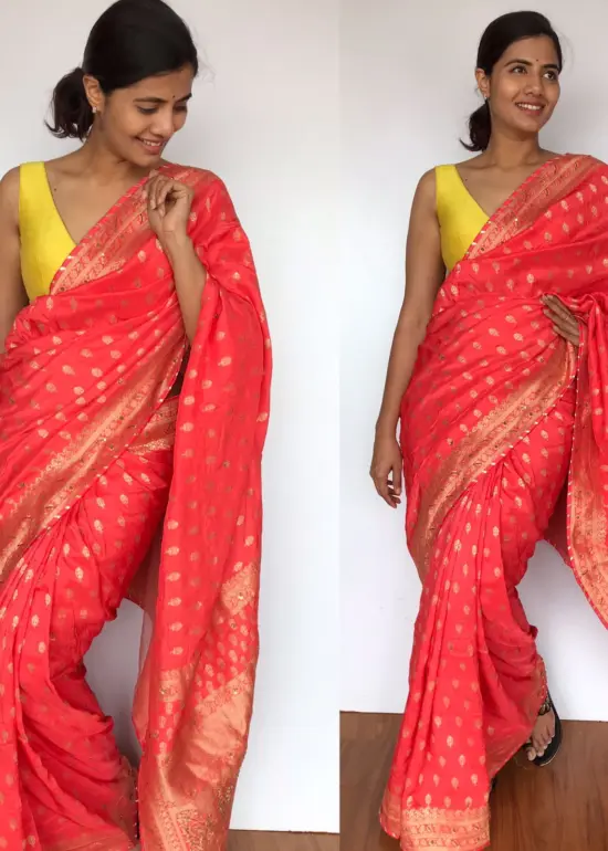 Peach Banarasi Georgette Saree with Golden Zari Weaves highlighted with Beautiful Zardozi Embroidery and Gota Piping