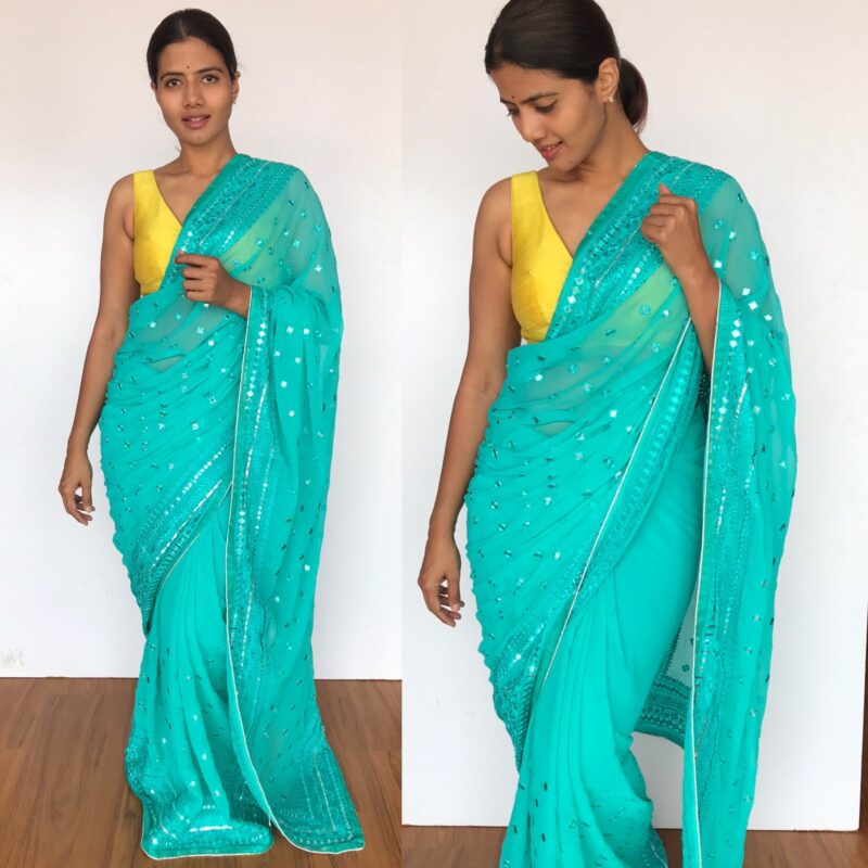 Turquoise Georgette Saree with Mirror Work and highlighted with Gota Work Border