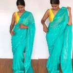 Turquoise Georgette Saree adorned with Mirror Work and highlighted with Gota Work Border - Image 5