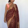 Maroon Banarasi Georgette Saree adorned with Antique Zari Motifs