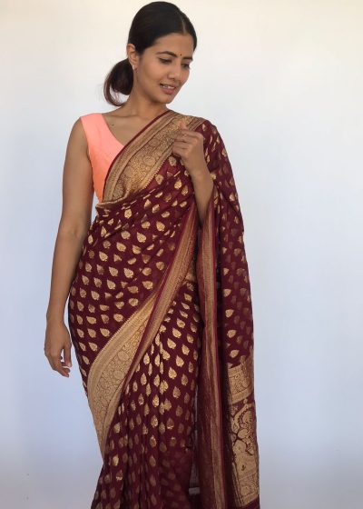 Maroon Banarasi Georgette Saree adorned with Antique Zari Motifs