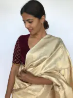 Ivory Banarasi Silk Saree adorned with Paisley Motifs