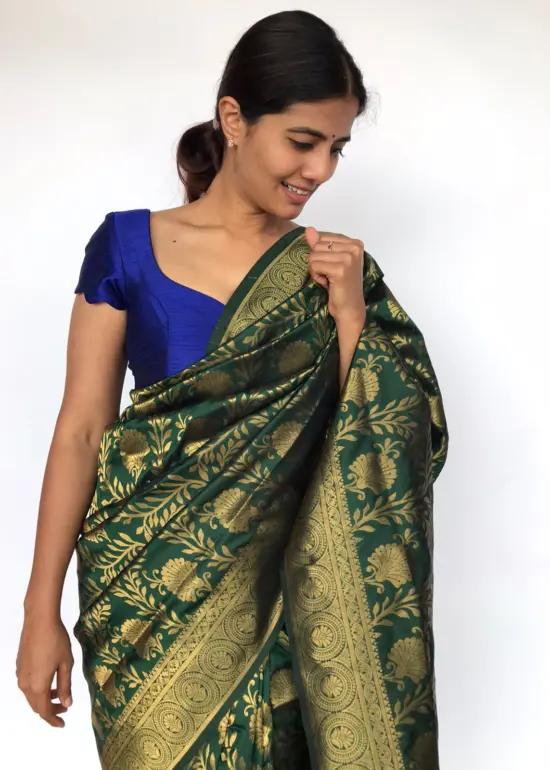 Bottle Green Banarasi Silk Saree adorned with Floral Weaves