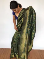 Bottle Green Banarasi Silk Saree adorned with Floral Weaves - Image 3