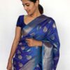 Blue Banarasi Silk Saree highlighted with Gold Zari Buttas