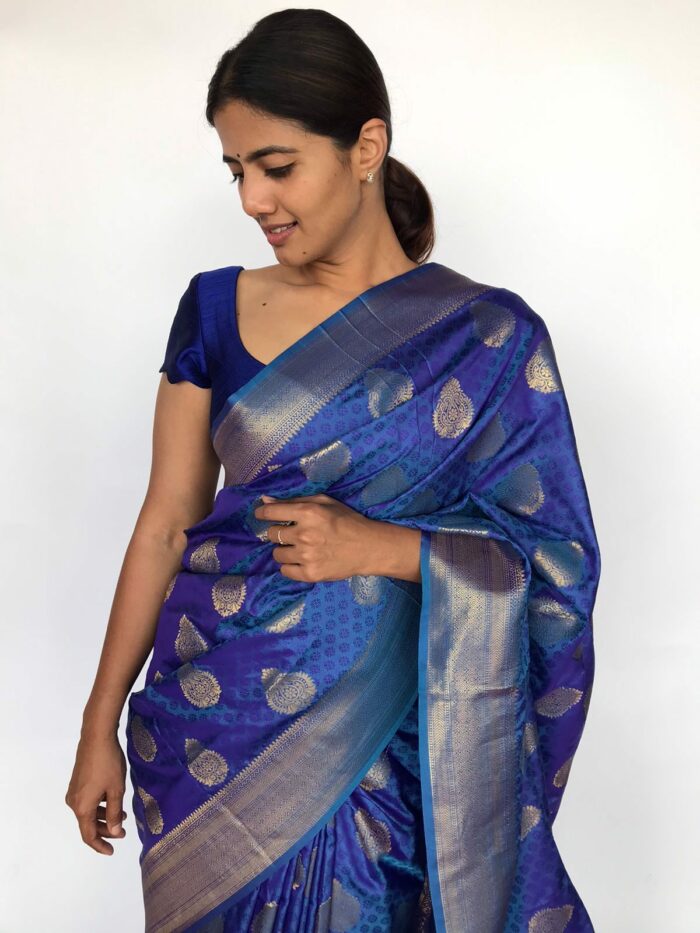 Blue Banarasi Silk Saree highlighted with Gold Zari Buttas