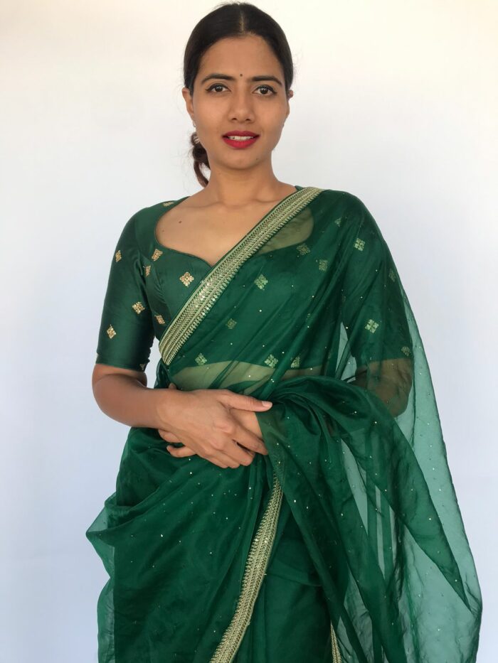 Bottle Green Organza Silk Saree with Embroidery Border adorned with Badla work