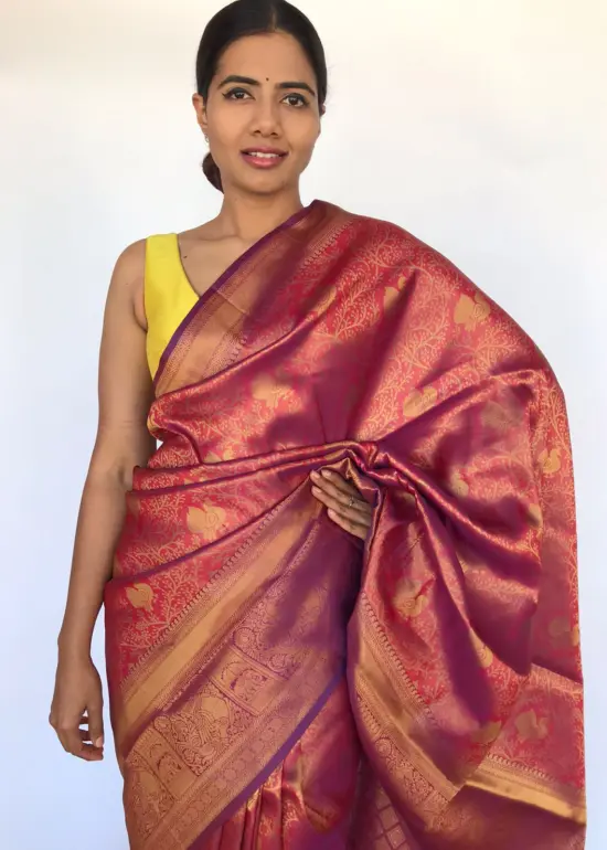 Red Banarasi Silk Saree with Purple tone adorned with Peacock Motifs