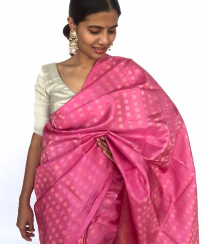 Rose Pink Kanjivaram Silk Saree highlighted with Gold and Silver Zari Weaves