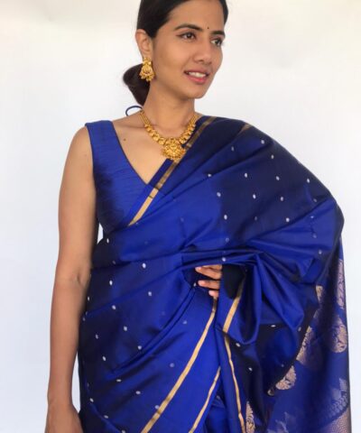 Royal Blue Kanjivaram Silk Saree highlighted with Silver Zari Buttis