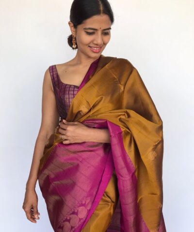 Mustard Kanjivaram Silk Saree highlighted with Paisley Motifs