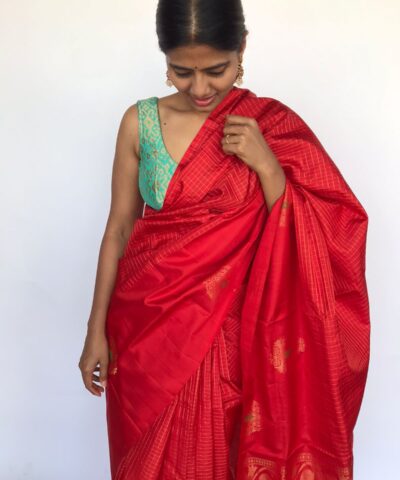 Red Kanjivaram Silk Saree Handwoven in Gold Zari Checks adorned with Gold Zari Woven Buttas