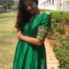 Green Silk Dress adorned with Hand Embroidery