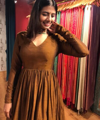 Mustard Cotton Ethnic Dress highlighted with Kanchi Silk Border