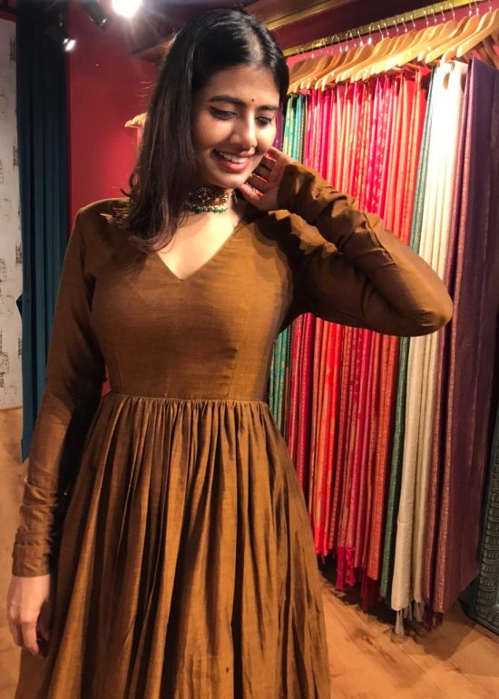 Mustard Cotton Ethnic Dress highlighted with Kanchi Silk Border