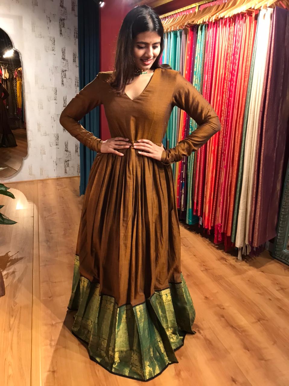 Mustard Cotton Ethnic Dress highlighted with Kanchi Silk Border