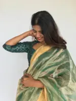 Sea Green Tissue Organza Silk Saree highlighted with Gold Zari Edging