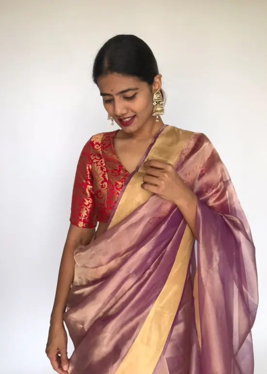 Purple Tissue Organza Silk Saree highlighted with Gold Zari Edging