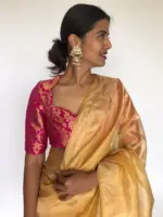Golden Yellow Tissue Organza Silk Saree highlighted with Gold Zari Edging