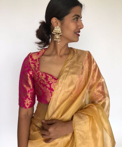 Golden Yellow Tissue Organza Silk Saree highlighted with Gold Zari Edging
