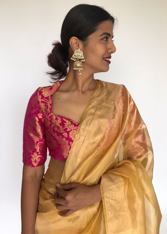 Golden Yellow Tissue Organza Silk Saree highlighted with Gold Zari Edging