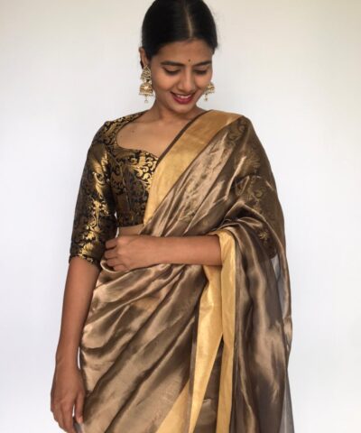 Metallic Gold Tissue Organza Silk Saree highlighted with Gold Zari Edging