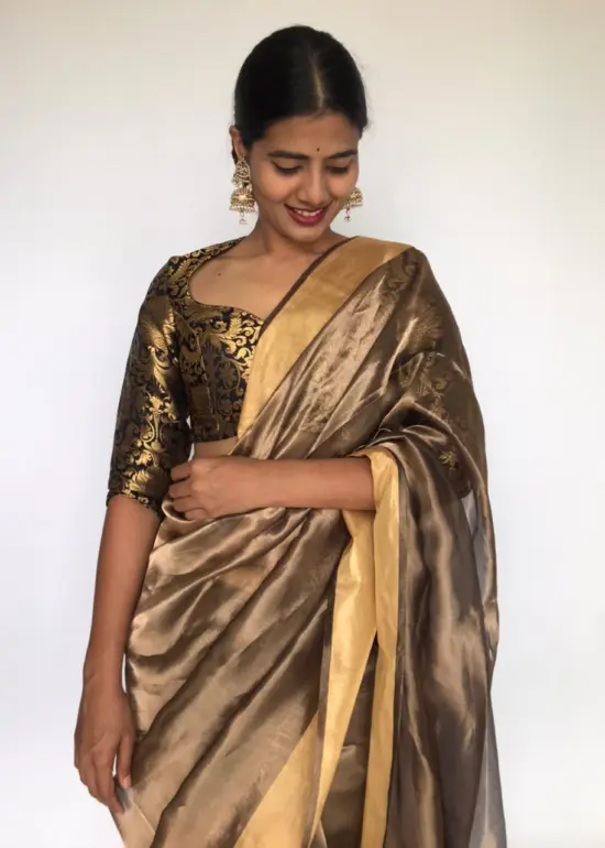 Metallic Gold Tissue Organza Silk Saree highlighted with Gold Zari Edging