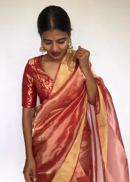 Red Tissue Silk Saree highlighted with Gold Zari Edging
