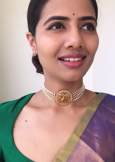 Pearl Choker with Pakshi Pendant highlighted with White Stones