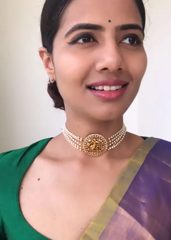 Pearl Choker with Pakshi Pendant highlighted with White Stones