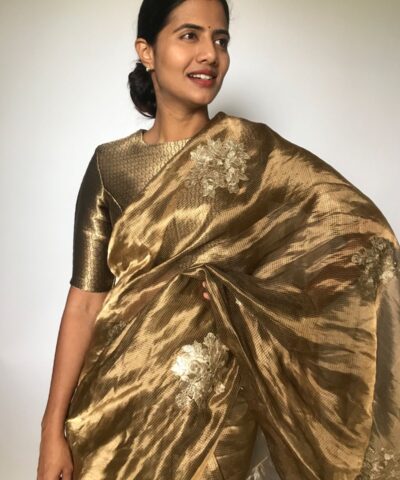 Metallic Tissue Silk Saree highlighted with Floral  Embroidery