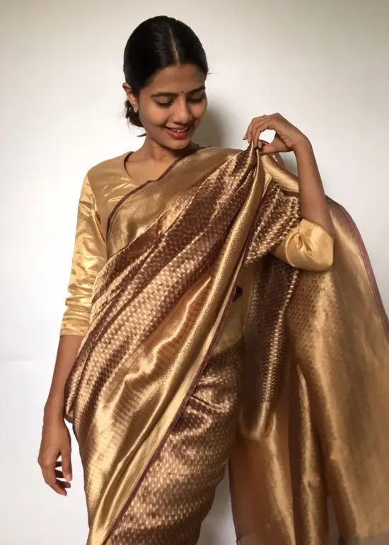 Metallic Brown Tissue Silk Saree with Resham Zari Weaves highlighted with Jacquard Zari Border